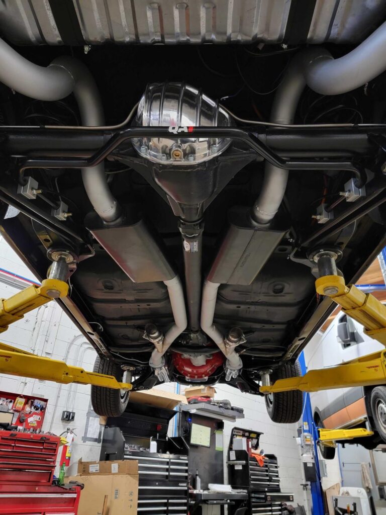 double pipe custom exhaust system underneath car